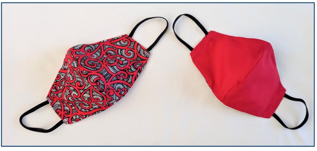 Reversible cloth face mask Te Koripi Wae o Maui pattern claret